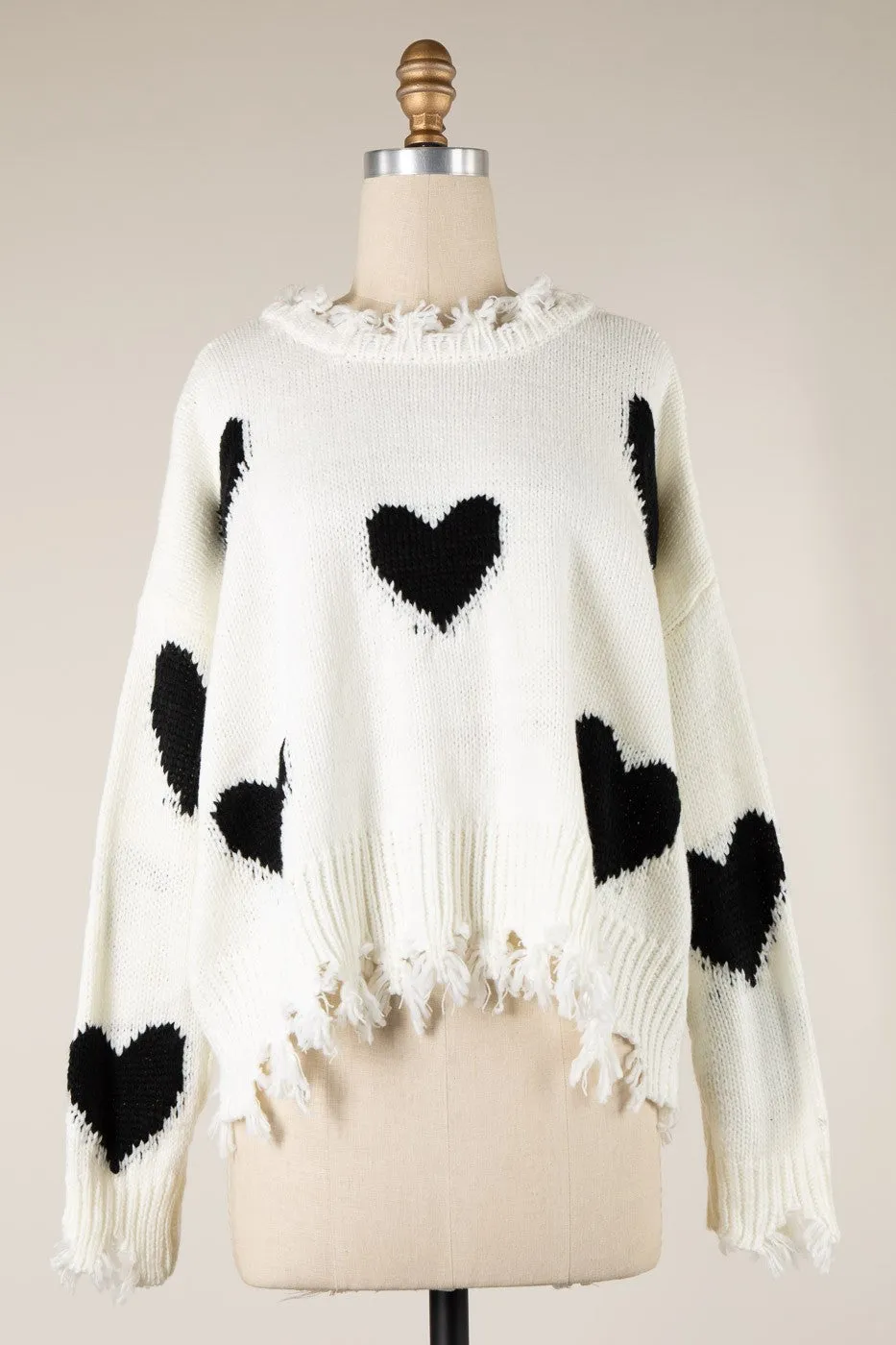 HEART PATTERN DISTRESSED HEM CABLE KNIT SWEATER